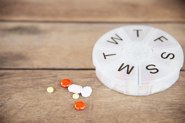 a pill organizer with different compartments for each day of the week.